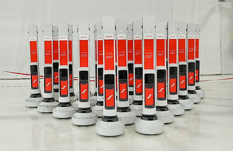 hero image of a large group of Tally mobile robots.