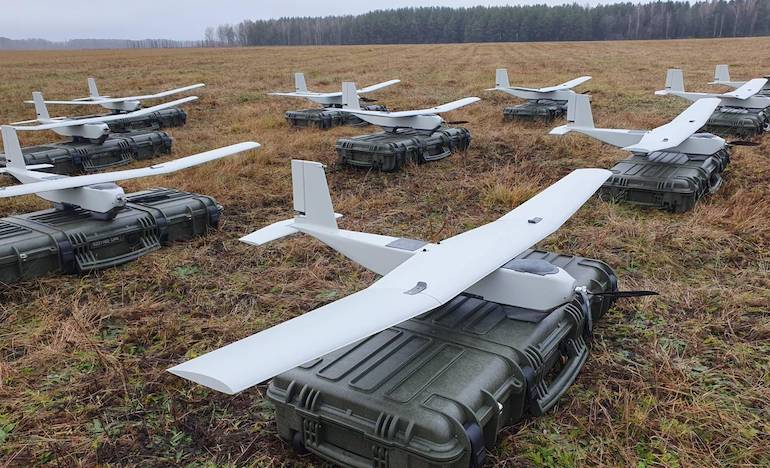 Fleet of portable Granta Hornet drones ready for takeoff.