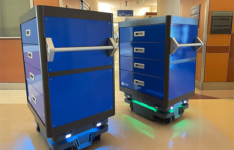 Jacksonville University's Chang Robotics Studio will demonstrate collaborative mobile robots, shown here at the Mayo Clinic.