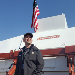 Paul Mikesell, CEO of Carbon Robotics, with the LaserWeeder system.