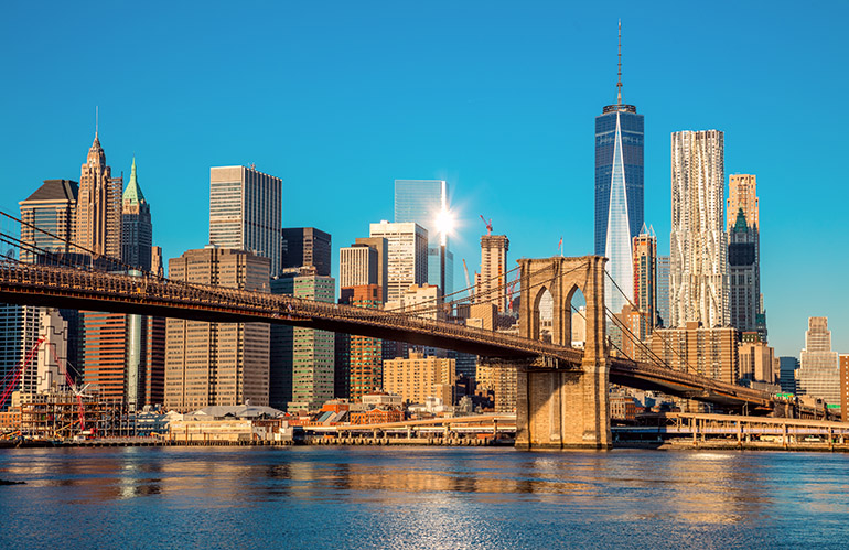 Image of lower Manhattan skyline and the Brooklyn Bridge. Brooklyn is the home of the New York Robotics Network.