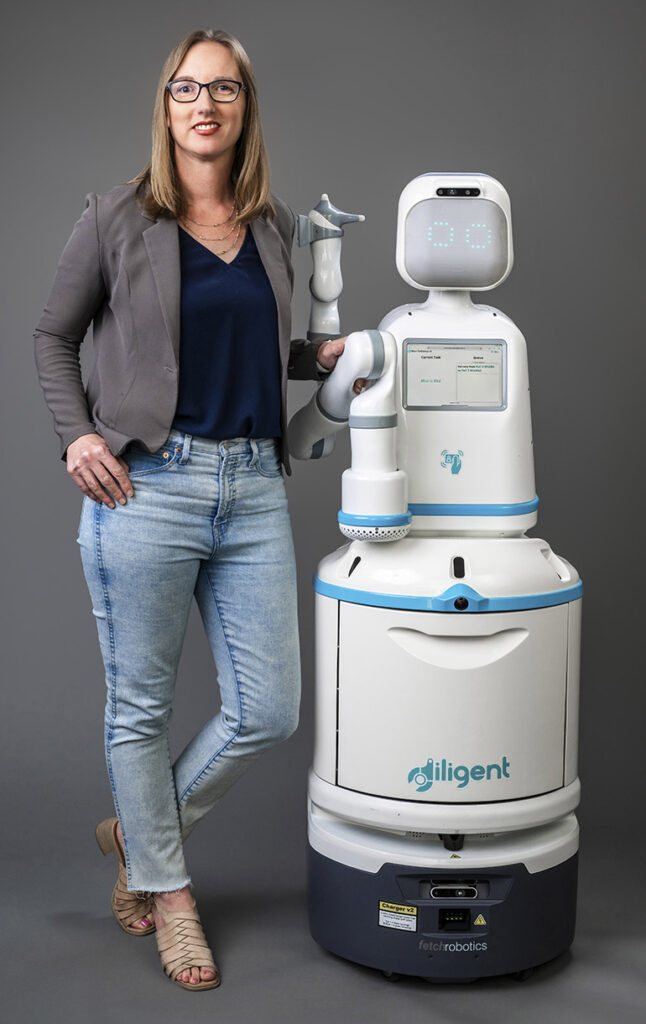 Diligent Robotics CEO Andrea Thomaz with Moxi.