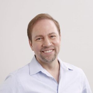 a headshot of Symbotic CTO James Kuffner.